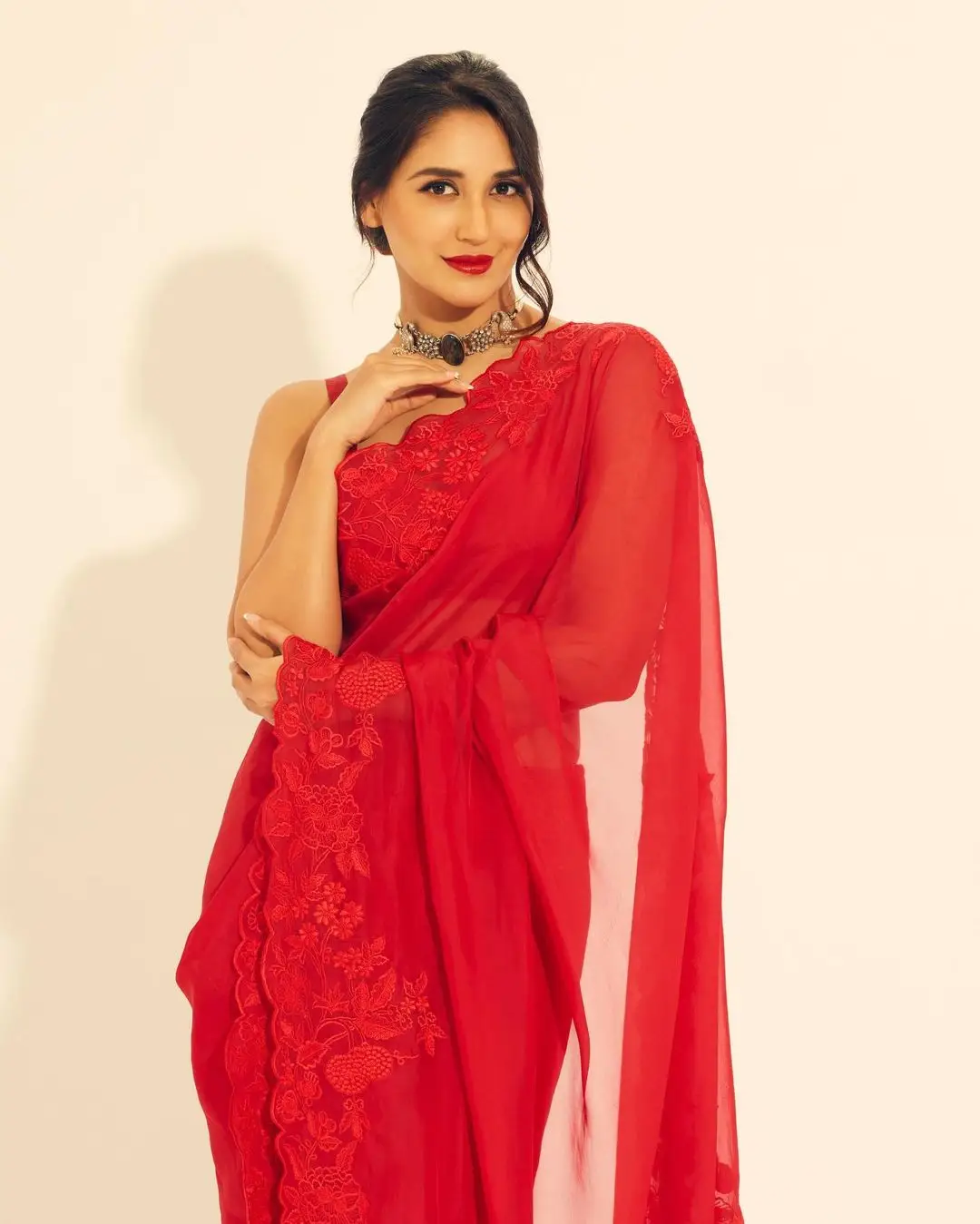 Marathi Actress Nikita Dutta in Red Saree Sleeveless Blouse